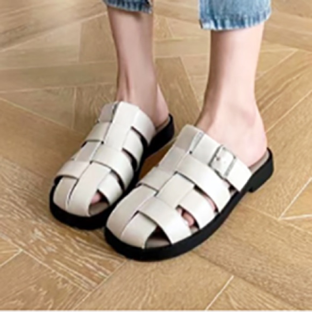 Cream and Black Closed-Toe Mules with Buckle Details